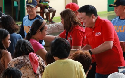 DSWD chief assures storm-displaced families of enough aid