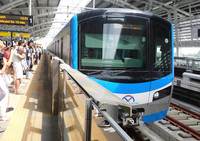 Urban railway cars arrive at a station in Ho Chi Minh City, Vietnam, on Sunday.