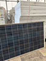 Used solar panels stacked inside a Tokyo Power Technology facility in the city of Kawasaki, Kanagawa Prefecture, on Dec. 10, 2024