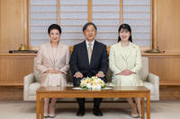 Japanese Emperor Naruhito, Empress Masako and their daughter, Princess Aiko, pose for a photo at the Imperial Palace in Tokyo on Sunday, three days before the arrival of 2025. (Courtesy of the Imperial Household Agency)