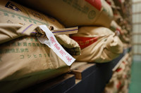 Bags of Japanese government-stockpiled rice in a warehouse in Saitama Prefecture on Feb. 18