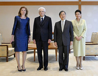 Japanese Emperor Naruhito (center right) and Empress Masako (right) pose for a picture with Italian President Sergio Mattarella (center left) at the Imperial Palace in Tokyo on Tuesday. (Pool photo)