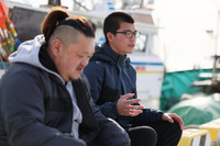 Teruki Hara, at the back, speaks during an interview in Soma, Fukushima Prefecture, on Jan. 27, 2025