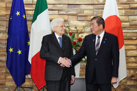 Japanese Prime Minister Shigeru Ishiba (right) shakes hands with Italian President Sergio Mattarella at the prime minister's office in Tokyo on Wednesday.