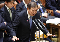 Prime Minister Shigeru Ishiba answers questions at the Budget Committee of the House of Councillors on Thursday.