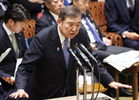 Prime Minister Shigeru Ishiba answers questions at a House of the Councillors Budget Committee meeting on Thursday.