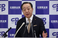 Yoshihiko Noda, leader of the Constitutional Democratic Party of Japan, speaks at a press conference in the Diet on Friday.