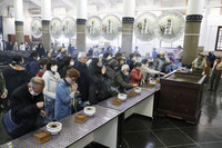 People gather at a memorial service in Tokyo on Monday for victims of the U.S. air raid on the Japanese capital on March 10, 1945. (Pool photo)