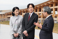 Crown Prince Akishino and Crown Princess Kiko inspect the Grand Ring in Osaka on Wednesday.