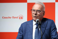 Couche-Tard Founder Alain Bouchard speaks at a press conference in Tokyo on Thursday.