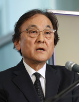 Fuji Media President Osamu Kanemitsu speaks to the press in Tokyo on Wednesday.