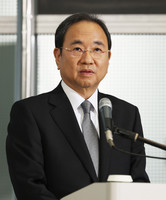 Fuji TV President Kenji Shimizu speaks to the press at the company's headquarters in Tokyo on Wednesday.