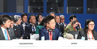Japanese Finance Minister Katsunobu Kato delivers a speech at the Asian Development Bank's annual meeting in Milan on Monday.