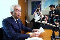 LDP lawmaker Shoji Nishida speaks to reporters in Tokyo on Friday.
