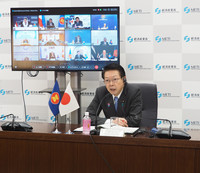 Japanese Minister of Economy, Trade and Industry Yoji Muto attends an online meeting with ASEAN ministers, in Tokyo on Tuesday. (Courtesy of the ministry)