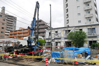 An explosion occurs at a condominium construction site in Tokyo on Tuesday.