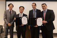 Agrolend CEO Andre Glezer (second from right) and JICA Brazil Office chief Akihiro Miyazaki (far left) participate in a signing ceremony in Sao Paulo, Brazil, on Wednesday.