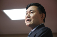 Rakuten Group Chairman and President Hiroshi Mikitani speaks to the press after meeting with agriculture minister Shinjiro Koizumi in Tokyo on Friday.