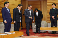 Japanese Prime Minister Shigeru Ishiba (center) attends a cabinet meeting Friday.