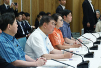 Japanese Prime Minister Shigeru Ishiba (second from left) speaks at a ministerial meeting on aid for the employment