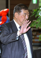 Prime Minister Shigeru Ishiba enters his office in Tokyo on Tuesday.