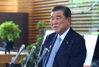 Prime Minister Shigeru Ishiba speaks to reporters at his office on Wednesday.
