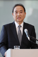 Fuji TV President Kenji Shimizu speaks to reporters in Tokyo on Thursday.