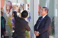 Japanese Prime Minister Shigeru Ishiba (right) on Saturday visits Jins Park, a regional revitalization hub set up in Maebashi, the capital of Gunma Prefecture, by Japanese eyeglasses store chain Jins Holdings Inc.