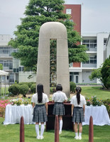 Students of Ikeda Elementary School in the city of Ikeda, Osaka Prefecture, deliver a memorial address at a ceremony Sunday to remember the eight students killed by a knife-wielding man who broke into the school on June 8, 2001. Sunday marks the 24th anniversary of the tragic incident.