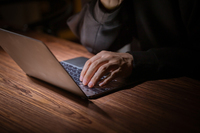 A person using a computer (image)