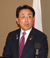 Japanese economic revitalization minister Ryosei Akazawa speaks to reporters in Washington on Friday.