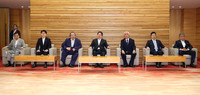 Chief Cabinet Secretary Yoshimasa Hayashi (center) and others attend a cabinet meeting at the prime minister's office in Tokyo on Tuesday.