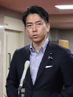 Japanese agriculture minister Shinjiro Koizumi speaks to reporters in Tokyo on Thursday.