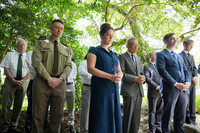 Katuya Toji (fourth right) prays with U.S. attendees at a memorial service held Friday at the Aburayama Kannon temple in Fukuoka's Jonan Ward for American POWs executed by the now-defunct Imperial Japanese Army in the closing days of WWII.