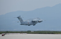 A C-2 transport aircraft takes off from the ASDF's Miho base in Tottori Prefecture on Saturday.