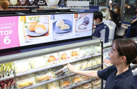 Digital signage displays information in response to customer action at Lawson's