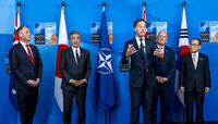 Japanese Foreign Minister Takeshi Iwaya (second from left) before a meeting of NATO and its four Indo-Pacific partners in The Hague, the Netherlands, on Wednesday (Courtesy of NATO)