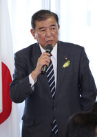 Prime Minister Shigeru Ishiba addresses a meeting of LDP secretaries-general from local chapters held at the party headquarters in Tokyo on Saturday.