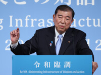 Prime Minister Shigeru Ishiba giving a speech in a conference hosted by a private policy proposal group in Tokyo on Sunday