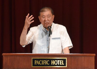 Prime Minister Shigeru Ishiba, who heads the Liberal Democratic Party, delivers a speech in Naha, Okinawa Prefecture, on Friday.