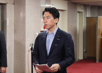Agriculture Minister Shinjiro Koizumi speaks to reporters in Tokyo on Friday.