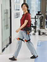 A woman wearing a mountaineering support robot by RoboCT in Hangzhou in the eastern China province of Zhejiang on June 24