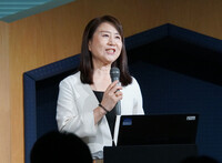 Wakako Yata, former special adviser to Japan's prime minister, speaks at an event in Tokyo Monday to mark the launch of a public-private consortium to foster female digital experts as she takes up the post of the new group's leader.
