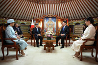 Japanese Emperor Naruhito (third from left) and Empress Masako (far left) meet with Mongolian President Ukhnaa Khurelsukh (second from right) and his wife (far right) in Ulaanbaatar, Mongolia, on Tuesday.