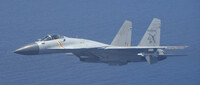 A Chinese fighter jet that flew abnormally close to a Japanese Maritime Self-Defense Force patrol aircraft in June (Courtesy of Japan's Defense Ministry)