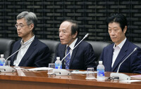 Bank of Japan Governor Kazuo Ueda (center) attends a meeting of the central bank's branch managers on Thursday. (Pool photo)