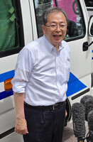 Komeito head Tetsuo Saito speaks to reporters in the city of Osaka on Thursday.