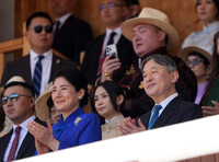 Japanese Emperor Naruhito and Empress Masako attend the opening ceremony for Naadam, Mongolia's largest festival, in Ulaanbaatar on Friday.