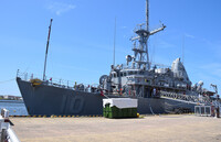 The USS Warrior, a U.S. Navy minesweeper, arrives at a port in the central Japan city of Niigata on Saturday.