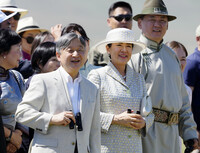Japan's Emperor Naruhito and Empress Masako watch a horse race at the Khui Doloon Khudag racecourse in a suburb of Ulaanbaatar, the capital of Mongolia, with Mongolian President Ukhnaa Khurelsukh and his wife on Saturday. (Pool photo)